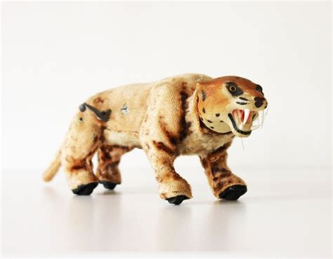 wind up metal lepord toy with fabric|VINTAGE MARX WIND UP FABRIC LEOPARD WORKS.